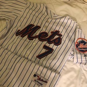 An official Mets jersey and Mets t-shirt